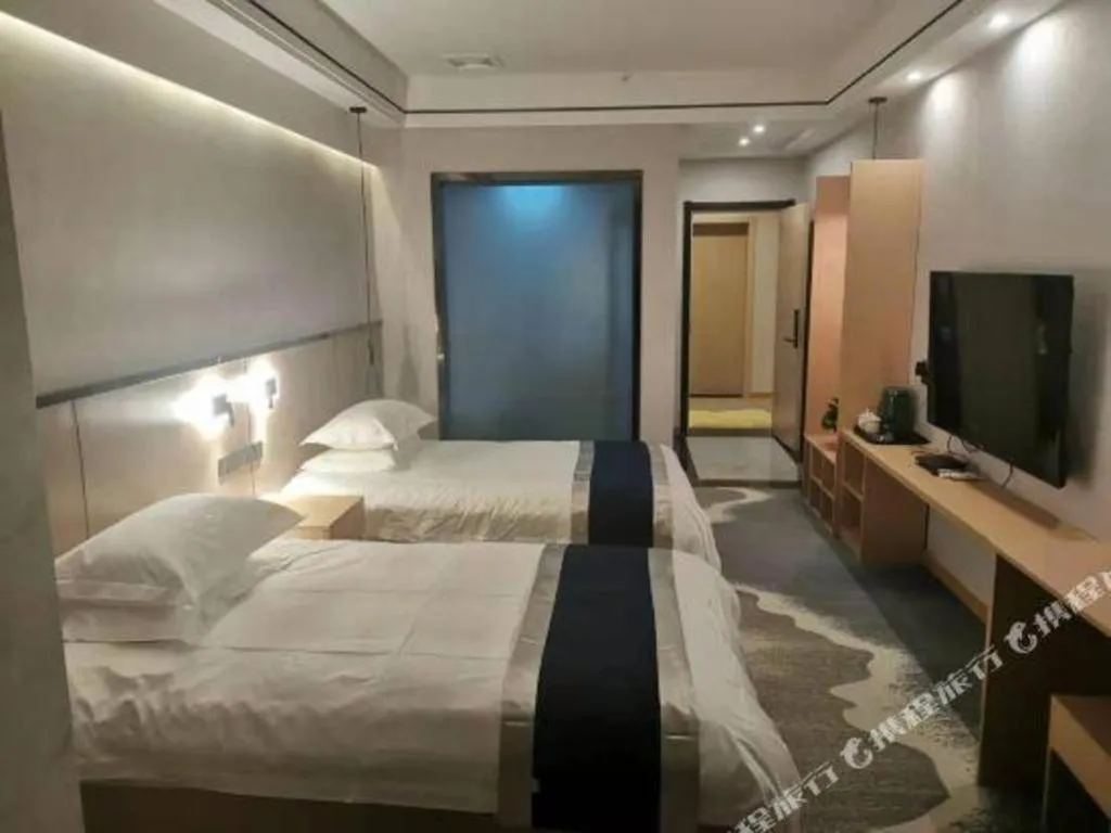 Bed in GELI Hotel Huainan Railway Station Sports Center