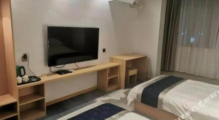 Bed in GELI Hotel Huainan Railway Station Sports Center