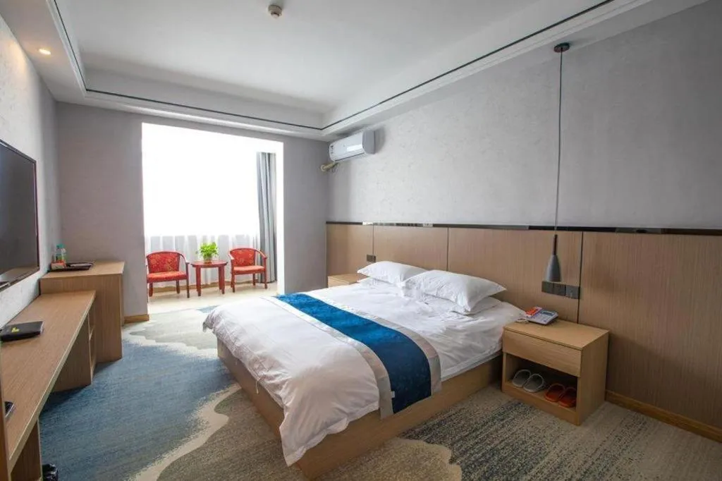 Bed in GELI Hotel Huainan Railway Station Sports Center