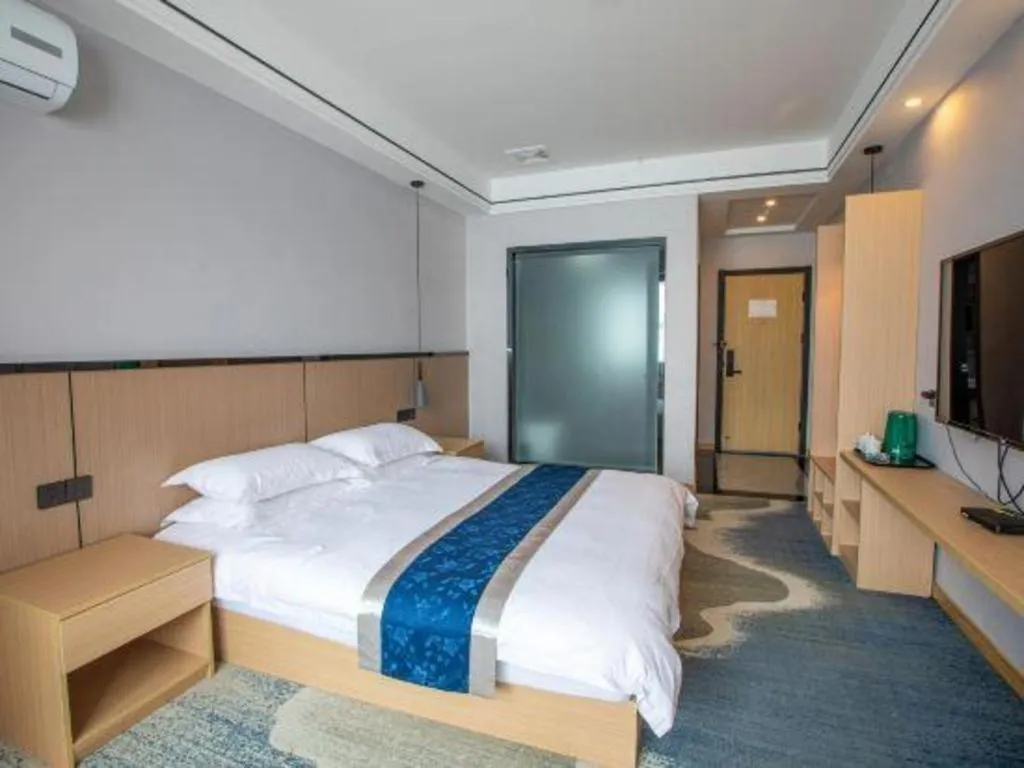 Bed in GELI Hotel Huainan Railway Station Sports Center