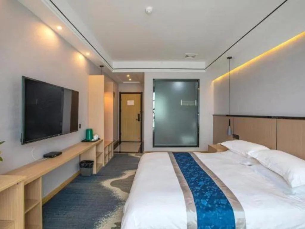 Bed in GELI Hotel Huainan Railway Station Sports Center