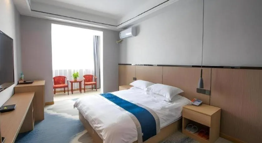 Bed in GELI Hotel Huainan Railway Station Sports Center