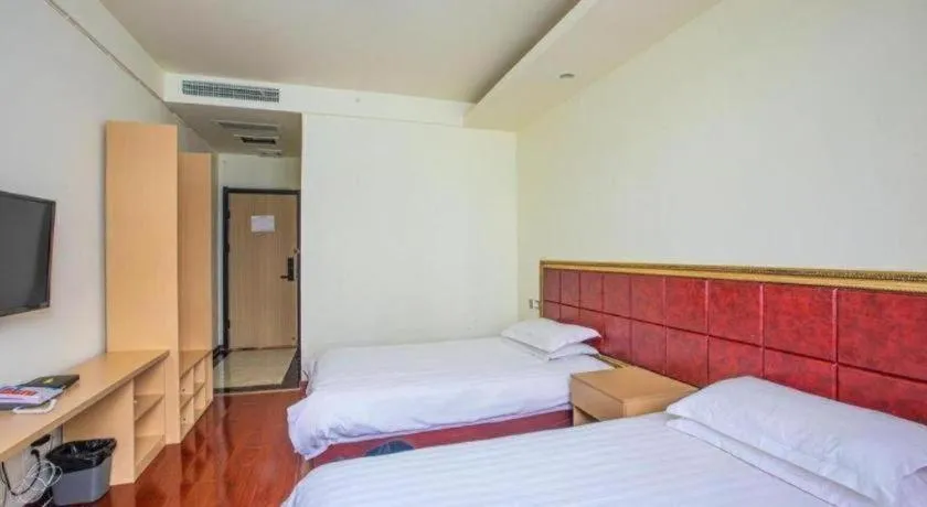 Bed in GELI Hotel Huainan Railway Station Sports Center