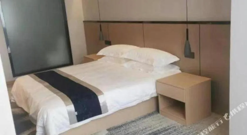 Bed in GELI Hotel Huainan Railway Station Sports Center