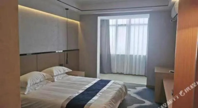 Bed in GELI Hotel Huainan Railway Station Sports Center