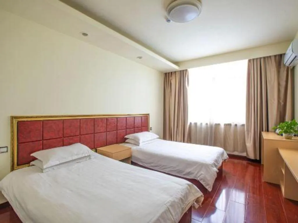 Bed in GELI Hotel Huainan Railway Station Sports Center