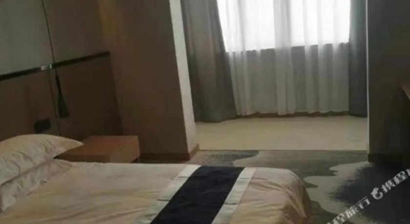 Bed in GELI Hotel Huainan Railway Station Sports Center