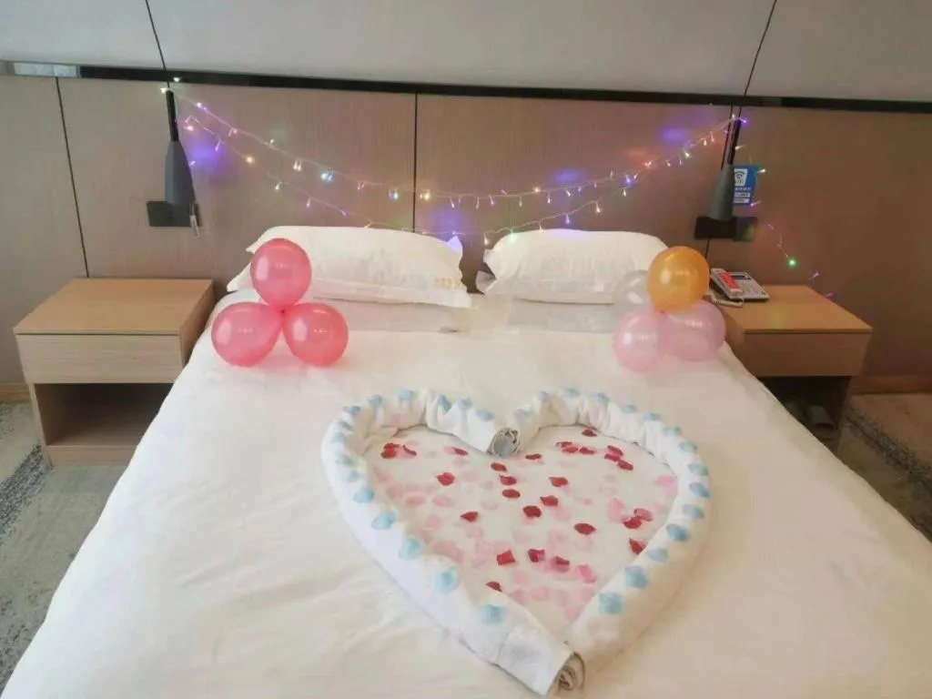Bed in GELI Hotel Huainan Railway Station Sports Center