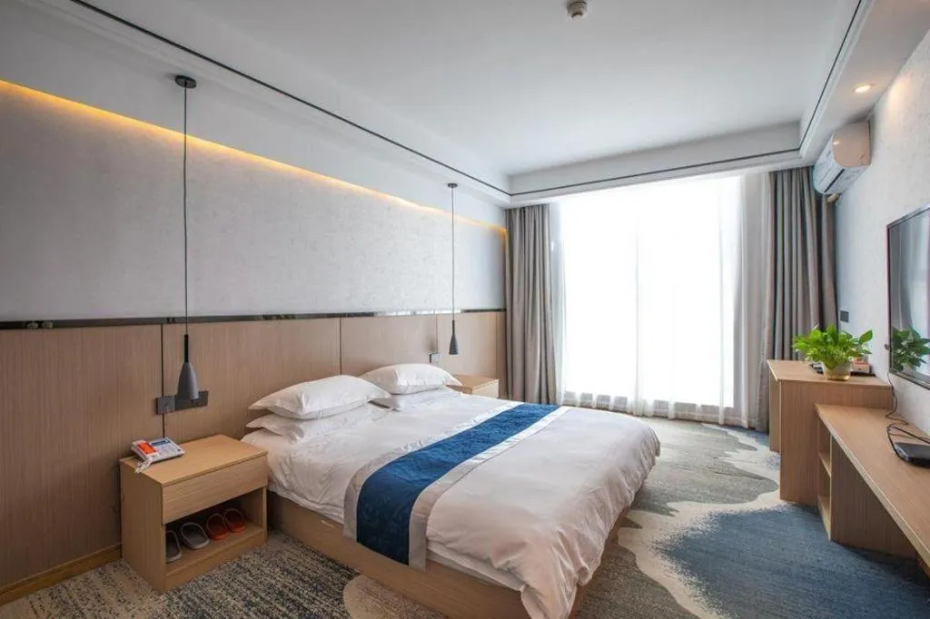 Bed in GELI Hotel Huainan Railway Station Sports Center