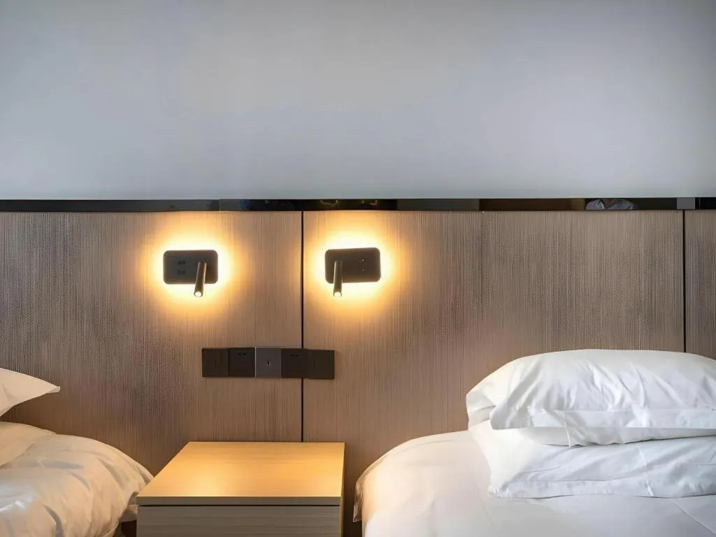 Bed in GELI Hotel Huainan Railway Station Sports Center