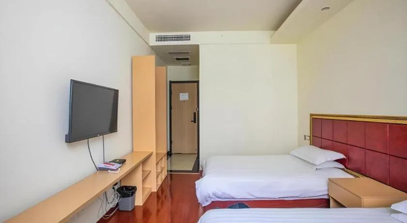 Bed in GELI Hotel Huainan Railway Station Sports Center