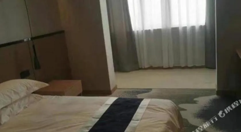 Bed in GELI Hotel Huainan Railway Station Sports Center