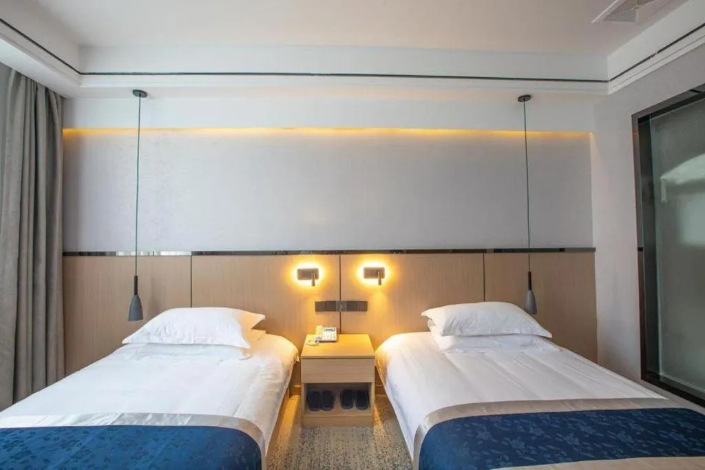 Bed in GELI Hotel Huainan Railway Station Sports Center