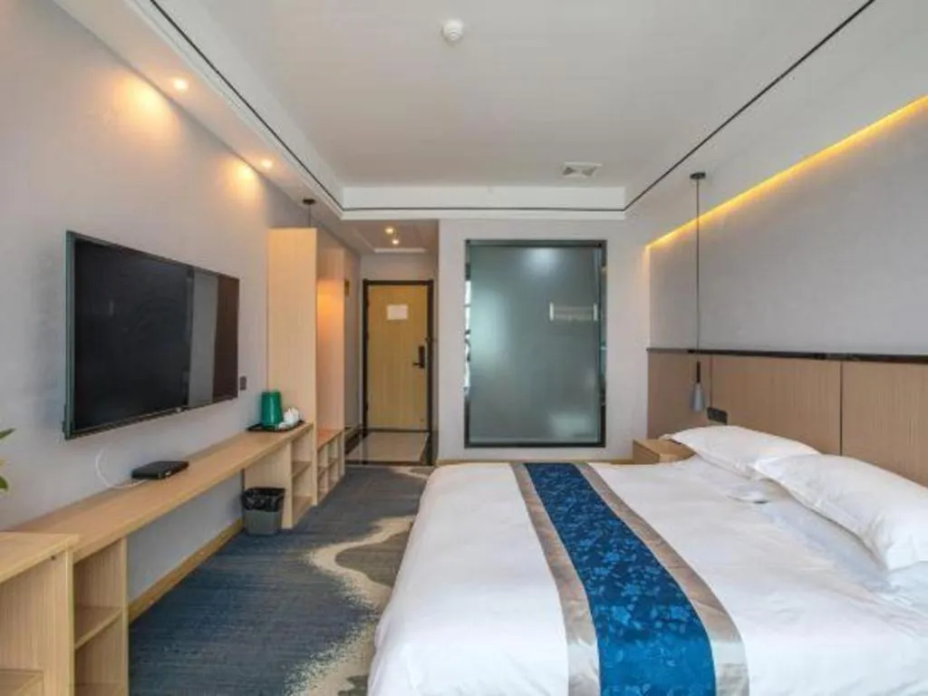 Bed in GELI Hotel Huainan Railway Station Sports Center