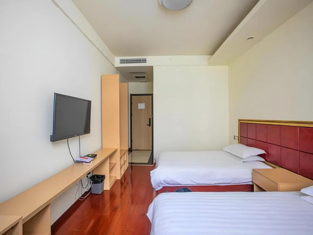 Bed in GELI Hotel Huainan Railway Station Sports Center