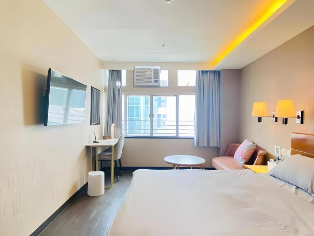 Bed in Sunny Day Hotel