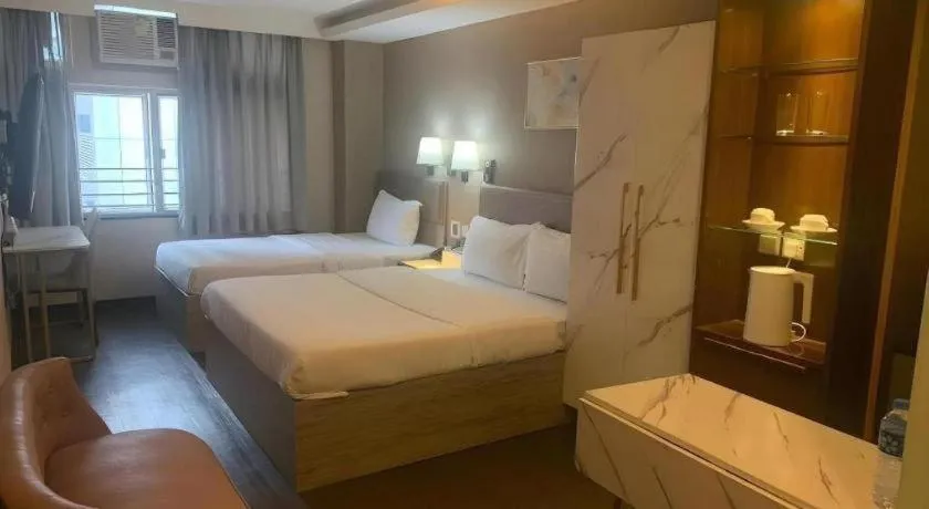 Bed in Sunny Day Hotel