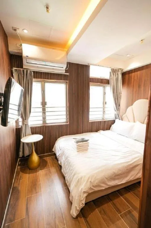 Bed in Sunny Day Hotel