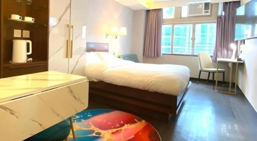 Bed in Sunny Day Hotel