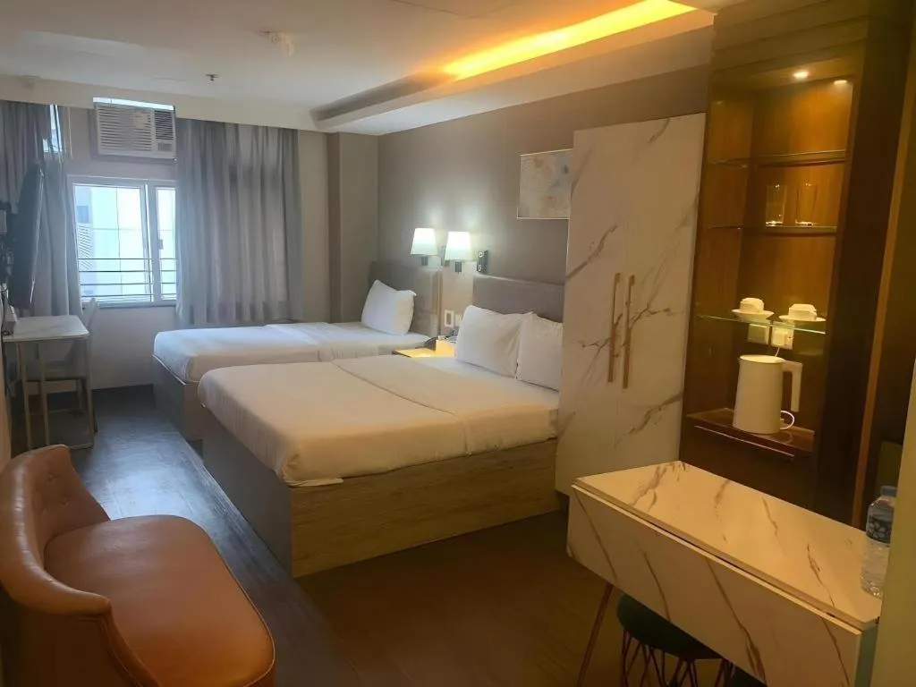 Bed in Sunny Day Hotel