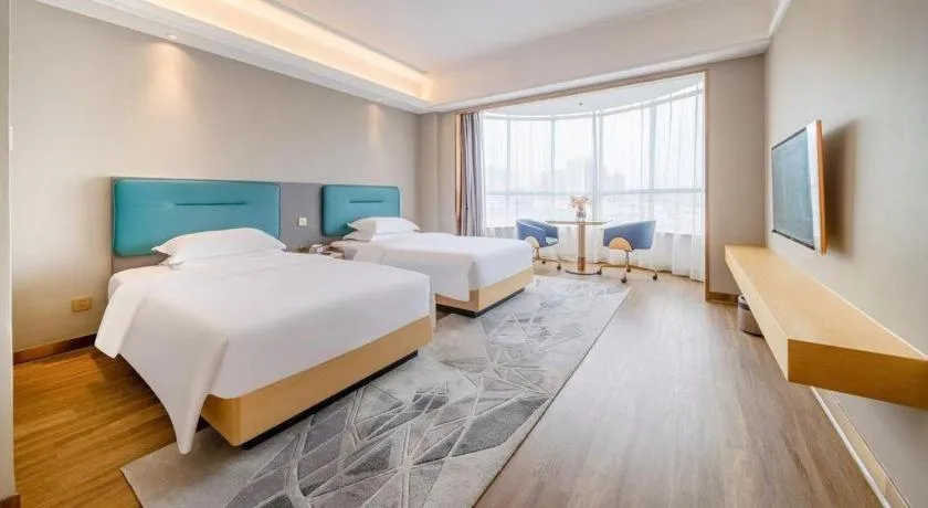 Bed in Cheermay Hotels