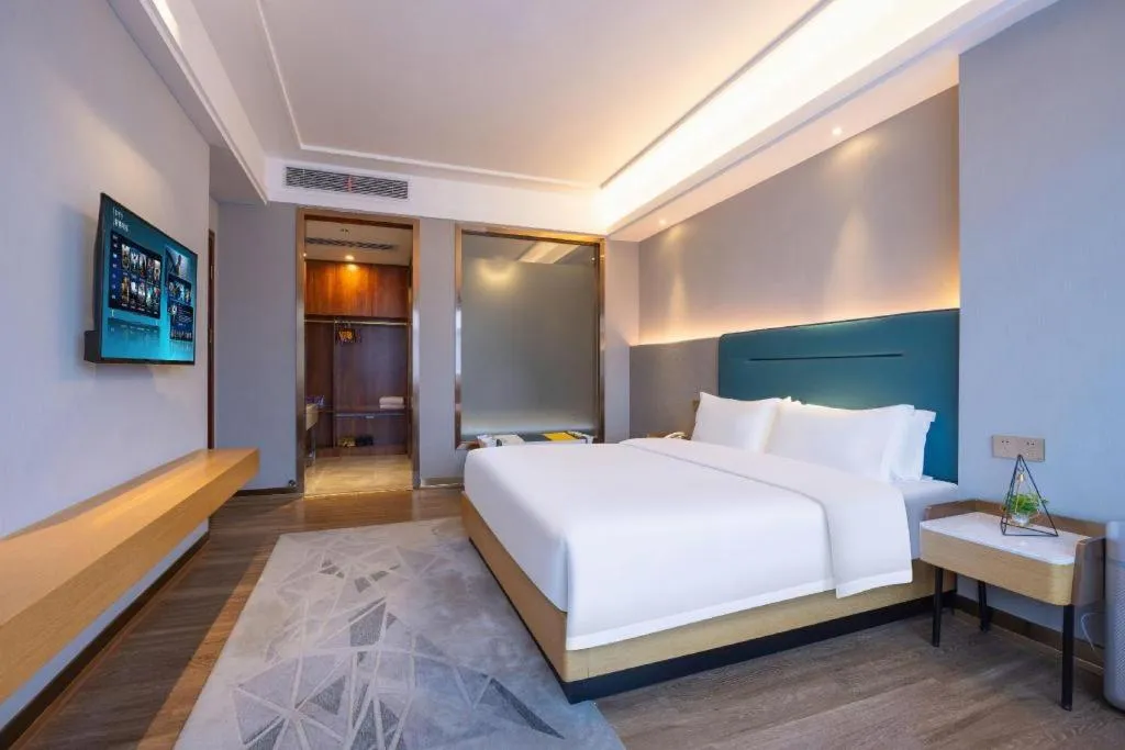 Bed in Cheermay Hotels