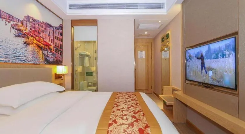 Bed in SHANGJINGHAO HOTEL （SAKATA SNOW ELEPHANT SUBWAY STATION SHOP）