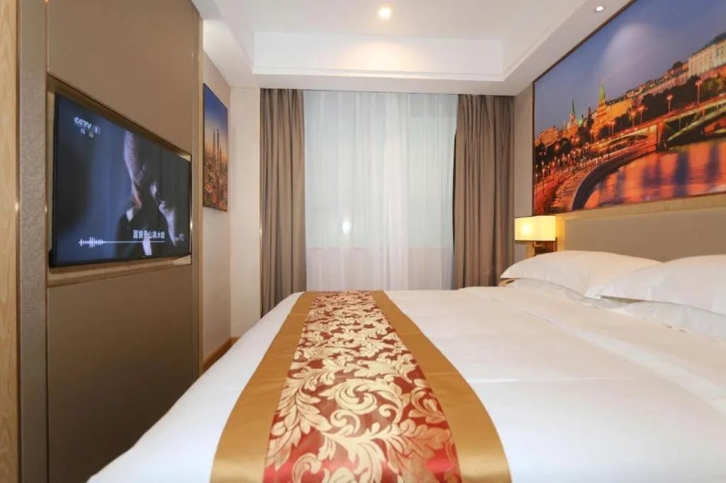 Bed in SHANGJINGHAO HOTEL （SAKATA SNOW ELEPHANT SUBWAY STATION SHOP）