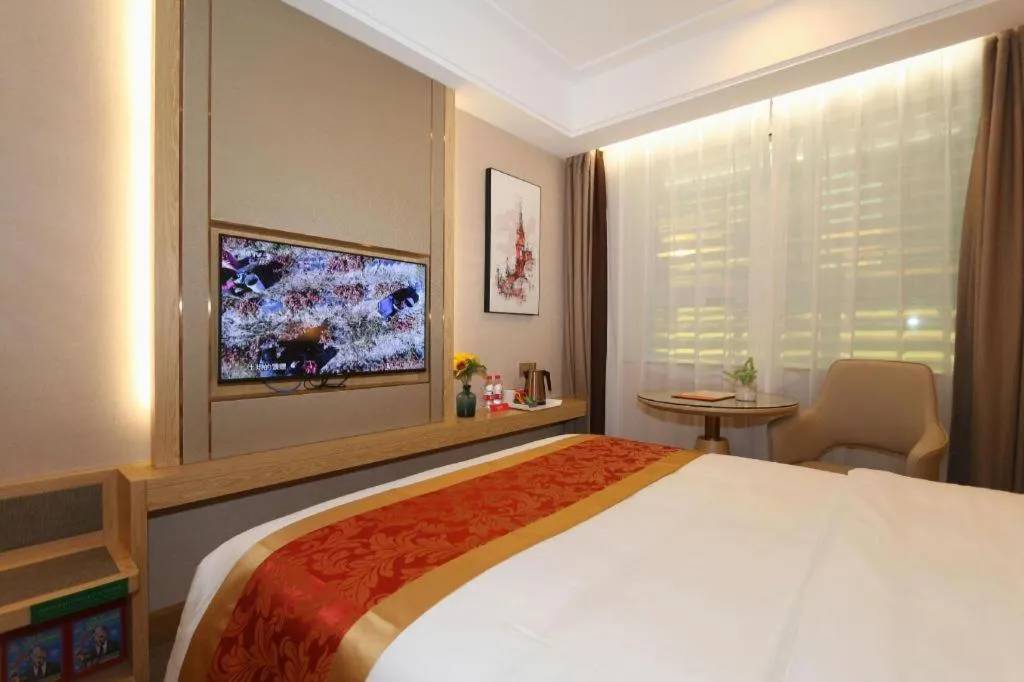 Bed in SHANGJINGHAO HOTEL （SAKATA SNOW ELEPHANT SUBWAY STATION SHOP）