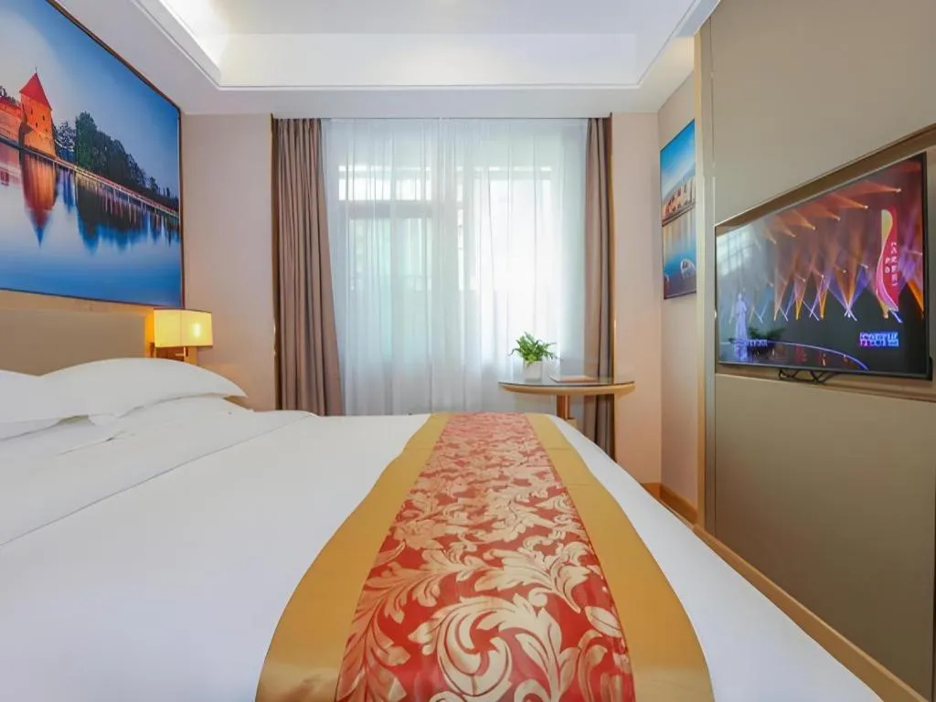 Bed in SHANGJINGHAO HOTEL （SAKATA SNOW ELEPHANT SUBWAY STATION SHOP）