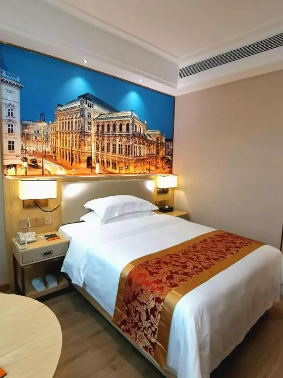 Bed in SHANGJINGHAO HOTEL （SAKATA SNOW ELEPHANT SUBWAY STATION SHOP）