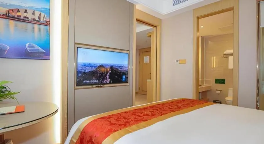 Bed in SHANGJINGHAO HOTEL （SAKATA SNOW ELEPHANT SUBWAY STATION SHOP）