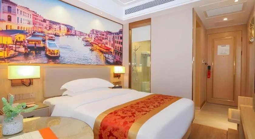 Bed in SHANGJINGHAO HOTEL （SAKATA SNOW ELEPHANT SUBWAY STATION SHOP）