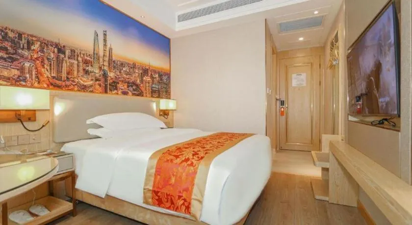 Bed in SHANGJINGHAO HOTEL （SAKATA SNOW ELEPHANT SUBWAY STATION SHOP）