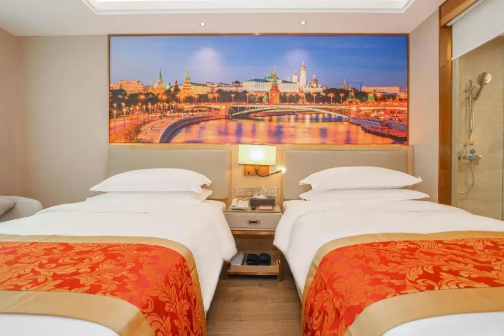 Bed in SHANGJINGHAO HOTEL （SAKATA SNOW ELEPHANT SUBWAY STATION SHOP）