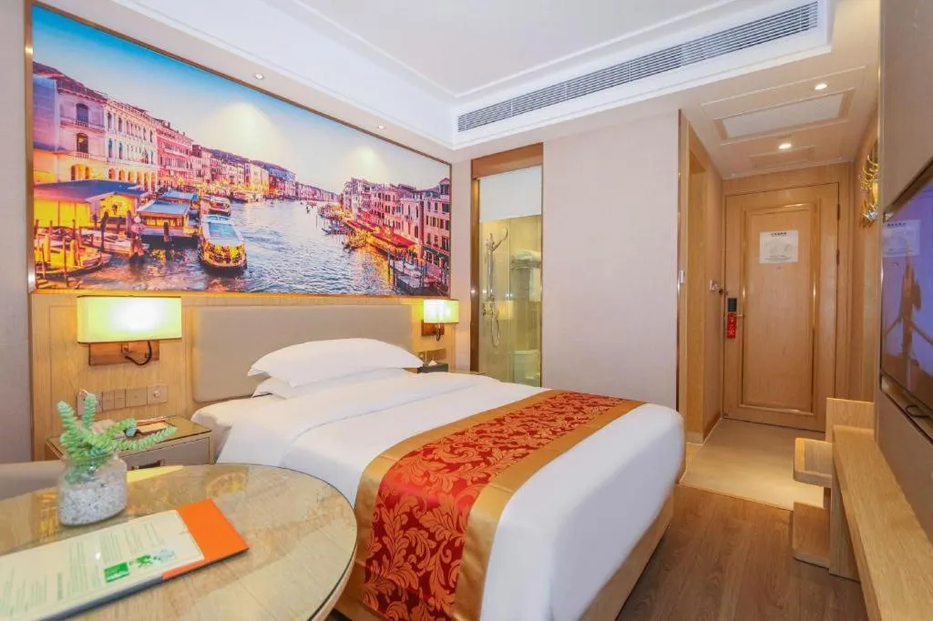 Bed in SHANGJINGHAO HOTEL （SAKATA SNOW ELEPHANT SUBWAY STATION SHOP）