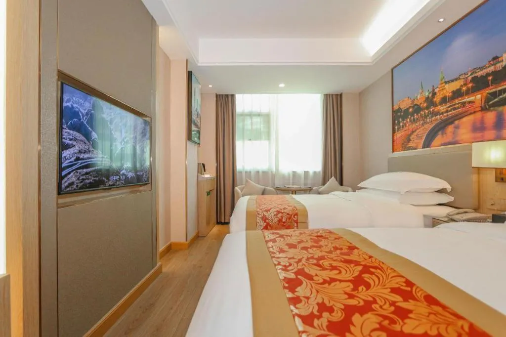 Bed in SHANGJINGHAO HOTEL （SAKATA SNOW ELEPHANT SUBWAY STATION SHOP）