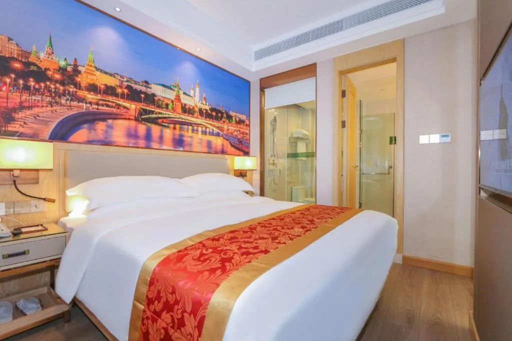 Bed in SHANGJINGHAO HOTEL （SAKATA SNOW ELEPHANT SUBWAY STATION SHOP）