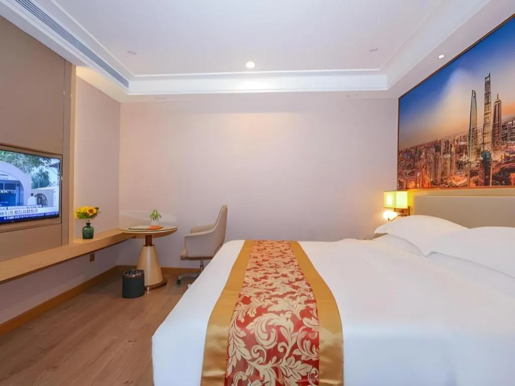 Bed in SHANGJINGHAO HOTEL （SAKATA SNOW ELEPHANT SUBWAY STATION SHOP）