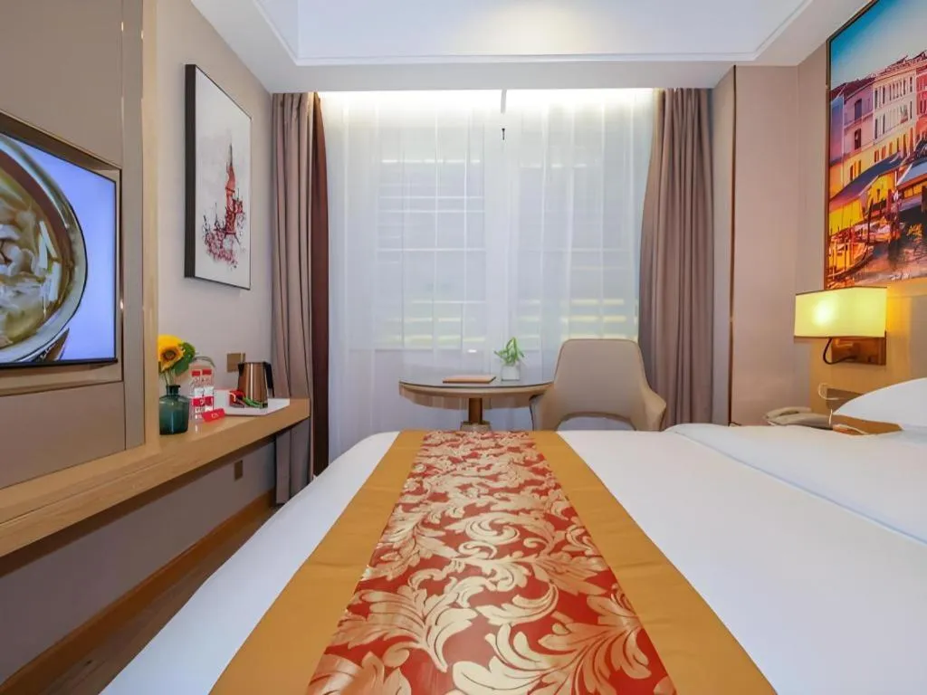 Bed in SHANGJINGHAO HOTEL （SAKATA SNOW ELEPHANT SUBWAY STATION SHOP）