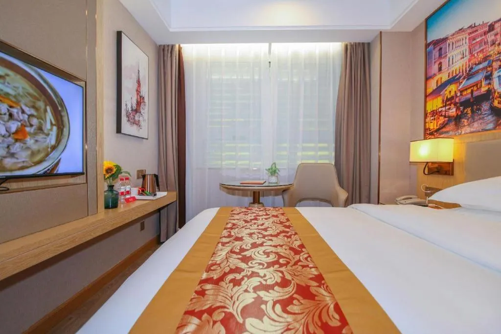 Bed in SHANGJINGHAO HOTEL （SAKATA SNOW ELEPHANT SUBWAY STATION SHOP）