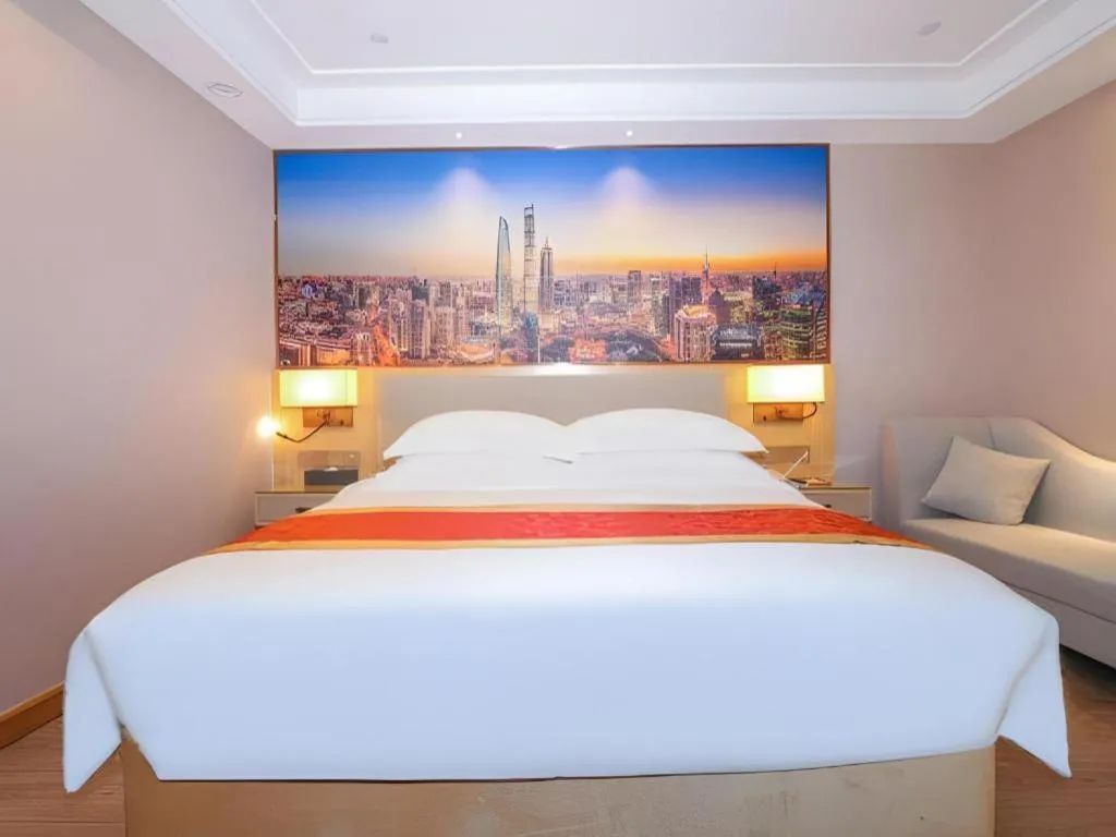 Bed in SHANGJINGHAO HOTEL （SAKATA SNOW ELEPHANT SUBWAY STATION SHOP）