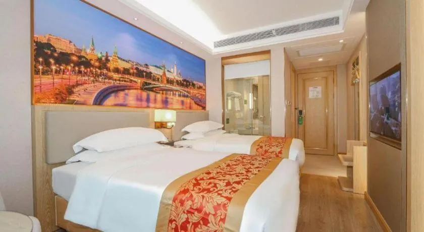 Bed in SHANGJINGHAO HOTEL （SAKATA SNOW ELEPHANT SUBWAY STATION SHOP）