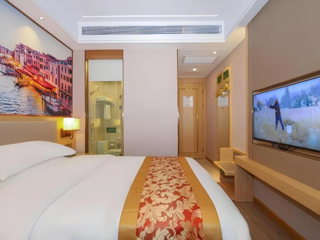 Bed in SHANGJINGHAO HOTEL （SAKATA SNOW ELEPHANT SUBWAY STATION SHOP）