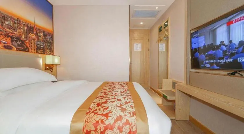 Bed in SHANGJINGHAO HOTEL （SAKATA SNOW ELEPHANT SUBWAY STATION SHOP）