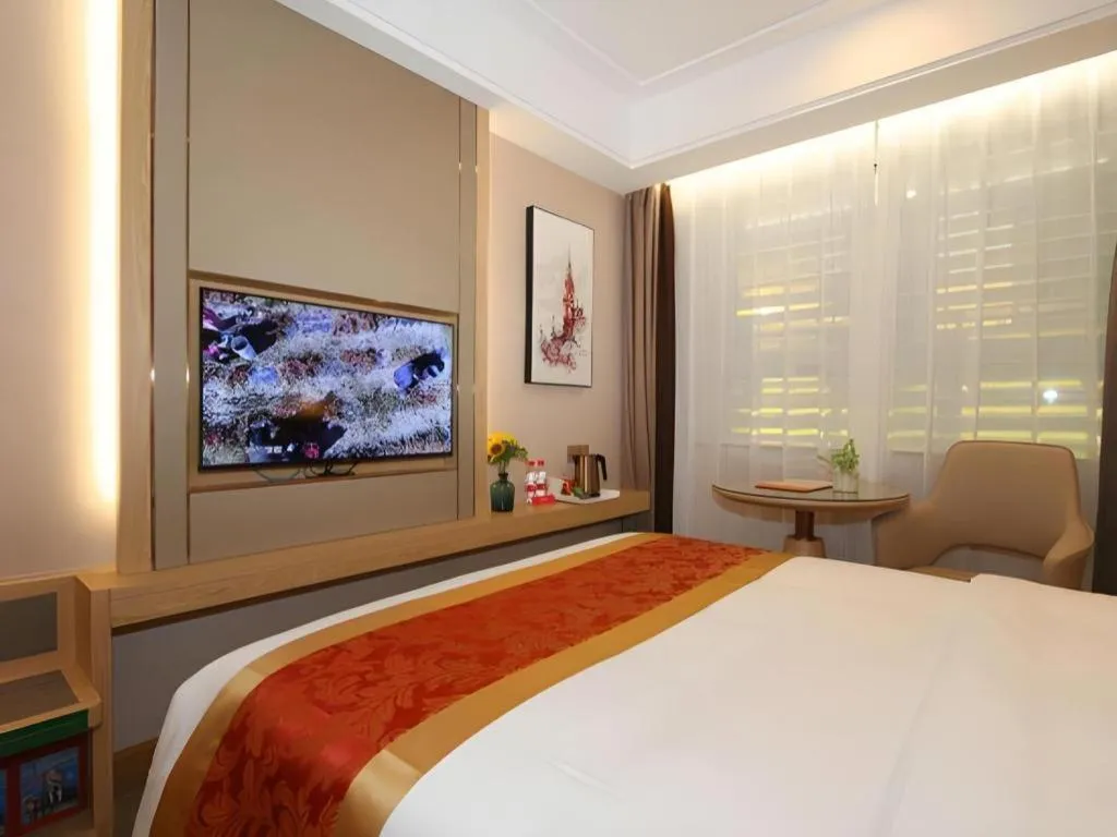 Bed in SHANGJINGHAO HOTEL （SAKATA SNOW ELEPHANT SUBWAY STATION SHOP）