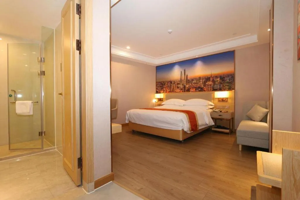 Bed in SHANGJINGHAO HOTEL （SAKATA SNOW ELEPHANT SUBWAY STATION SHOP）