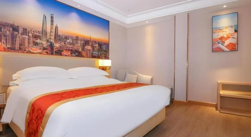 Bed in SHANGJINGHAO HOTEL （SAKATA SNOW ELEPHANT SUBWAY STATION SHOP）