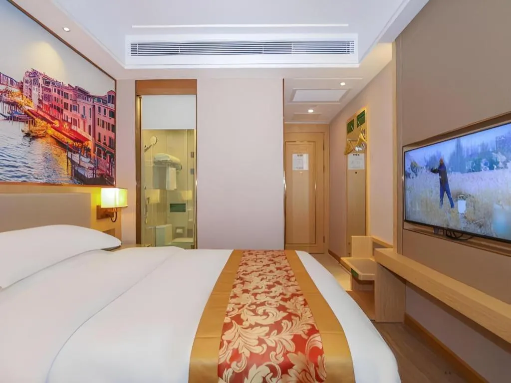 Bed in SHANGJINGHAO HOTEL （SAKATA SNOW ELEPHANT SUBWAY STATION SHOP）