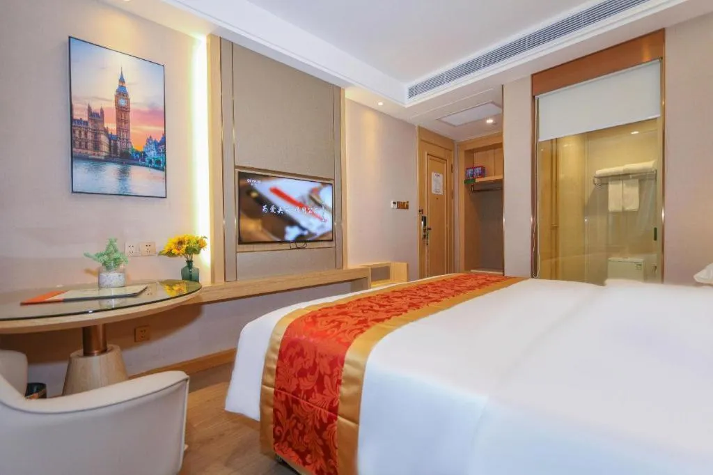 Bed in SHANGJINGHAO HOTEL （SAKATA SNOW ELEPHANT SUBWAY STATION SHOP）